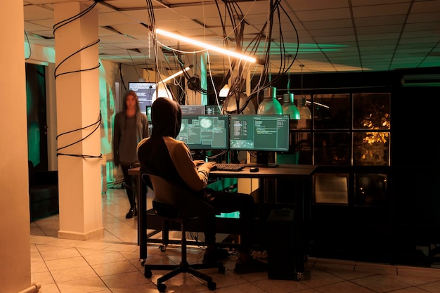 Cyber security, cybercriminal planting trojan virus to cause computer malware and security breach. Hacking system to steal government information, crack data protection encryption.
