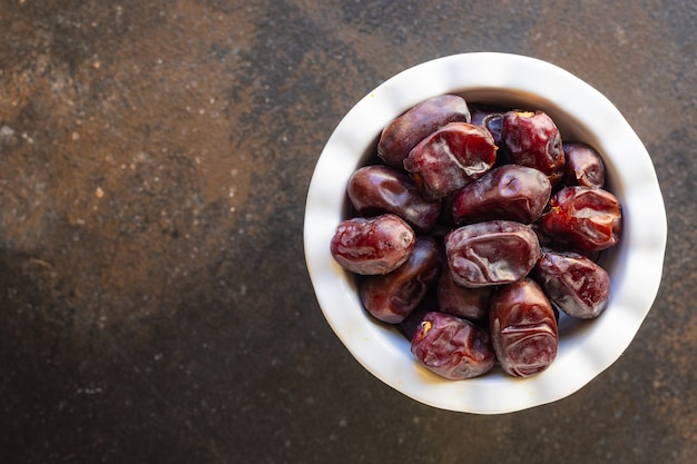 Data di frutta dolce frutta secca gustoso spuntino dieta vista dall'alto