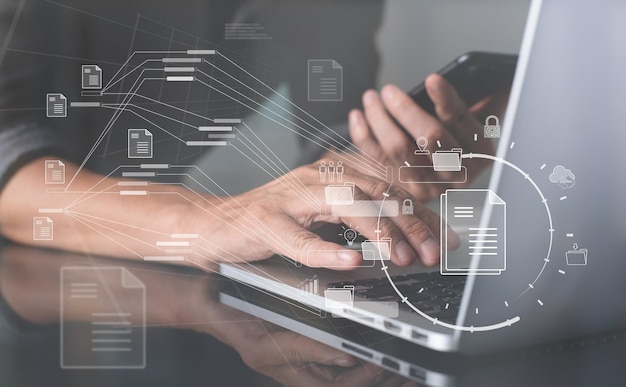 Database directory Edocument paperless office concept Business man working on laptop cpmputer with electronic document on virtual screen