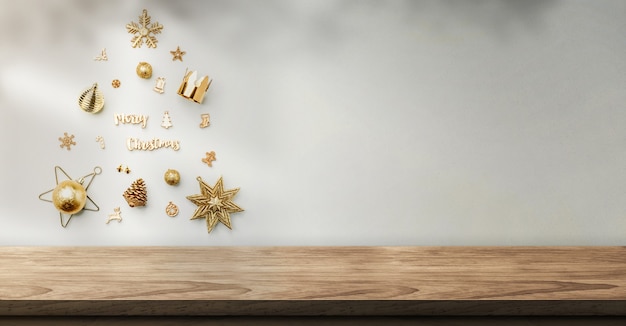 Decorazione di oggetti di Natale a forma di albero di Natale sulla parete con ombra di luce solare sulla parete sopra il tavolo