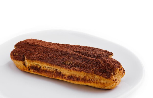 delizioso cioccolato eclair francese sul piatto