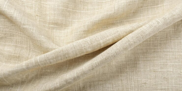 Descrizione dell'elegante tessuto di lino beige senza tempo, senza cuciture e morbido