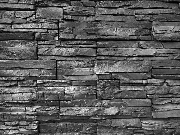Desigh di pietra moderna del muro di mattoni con fondo