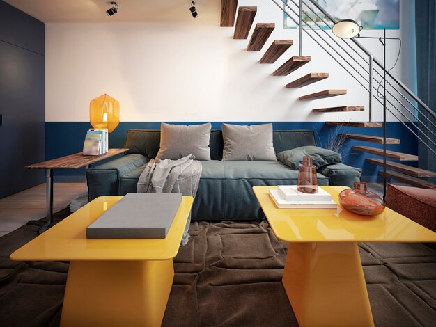 Design della stanza di un adolescente con un divano blu alla moda e due tavoli di design gialli.