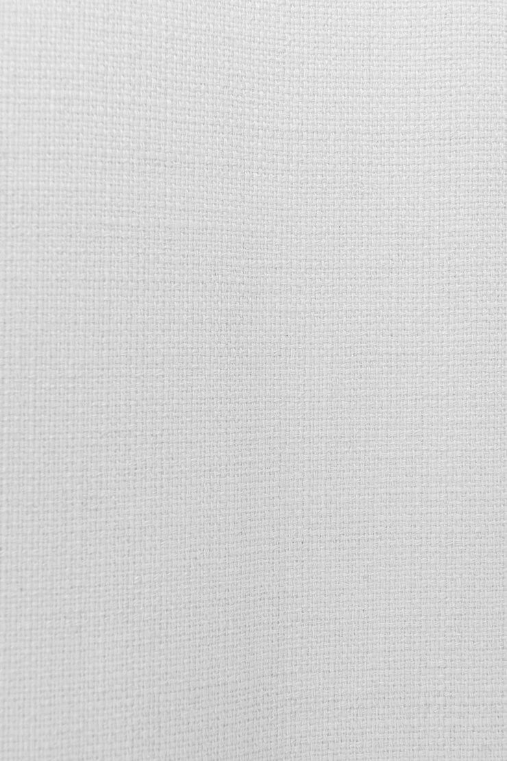 Foto dettagli sullo sfondo bianco e sulla consistenza del tessuto