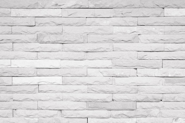 Dettaglio di una struttura di parete di mattoni bianchi e sfondo con spazio di copia