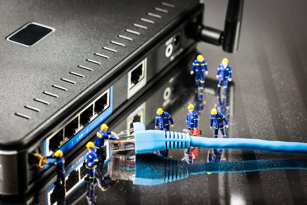 diagnosi della connessione del cavo Ethernet blu e del router wireless nero