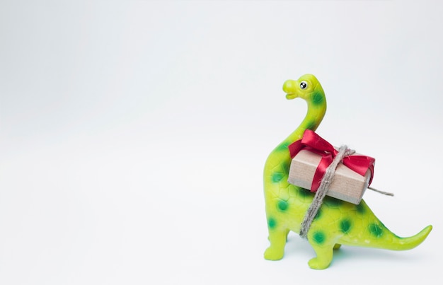 Dinosauro giocattolo adorabile con regalo di Natale