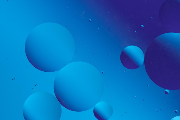 Disegno astratto blu con colori gradienti e forme di bolle
