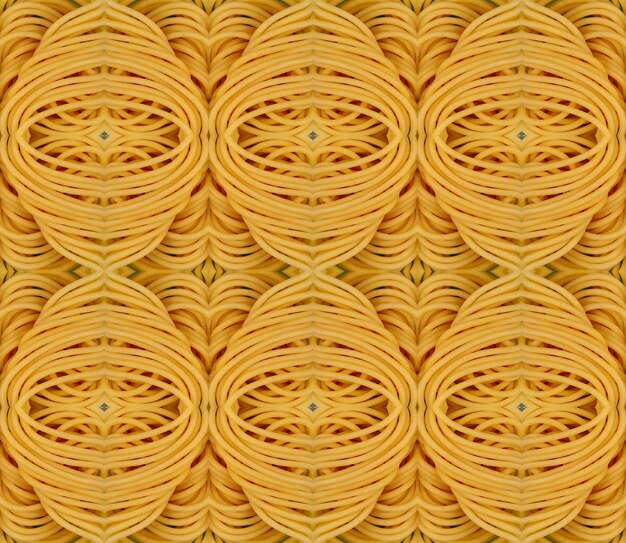 Disegno astratto senza cuciture di pasta gialla di grano duro Closeup Kaleidoscopico sullo sfondo