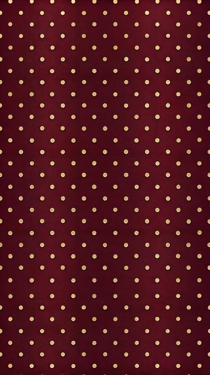 Disegno con piccoli punti uniformemente distanziati su uno sfondo rosso reale