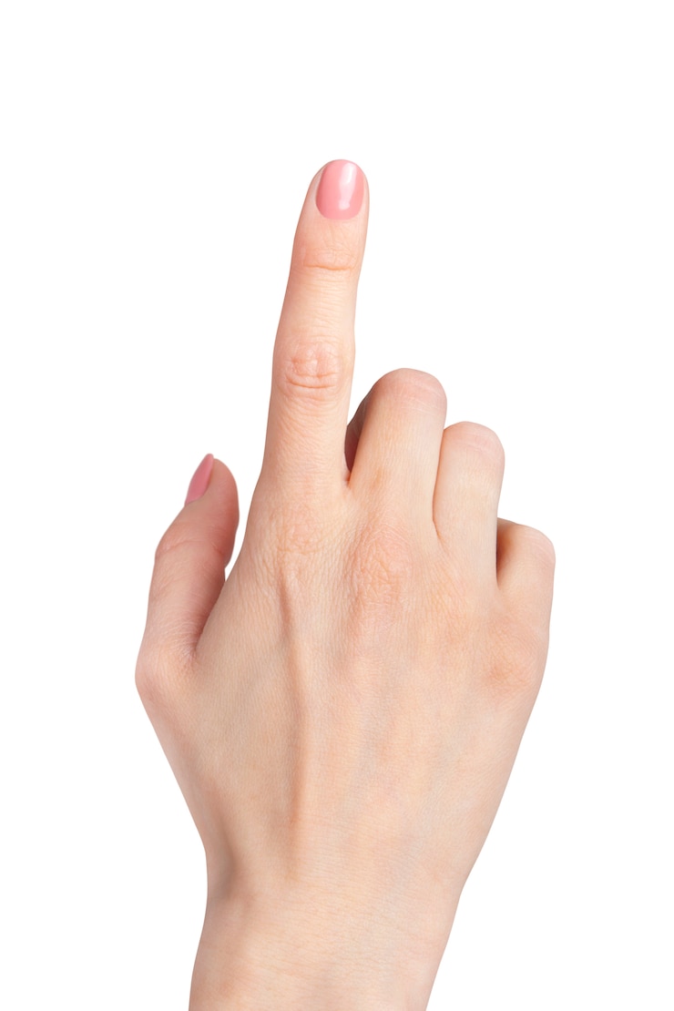 Foto dito indice femminile della mano che indica in su isolato