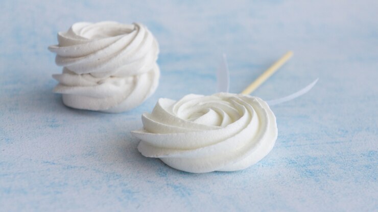 Dolci caramelle marshmallow su stecco