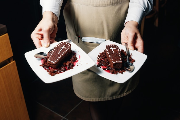 Dolci da ristorante a forma di bare, il tema di Halloween.