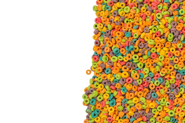 Dolci fiocchi multicolori, fiocchi di cereali come sfondo..