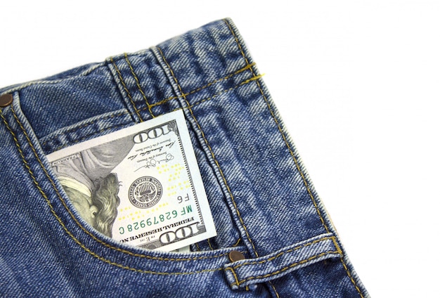 dollari nella tasca posteriore dei jeans. concetto di paghetta