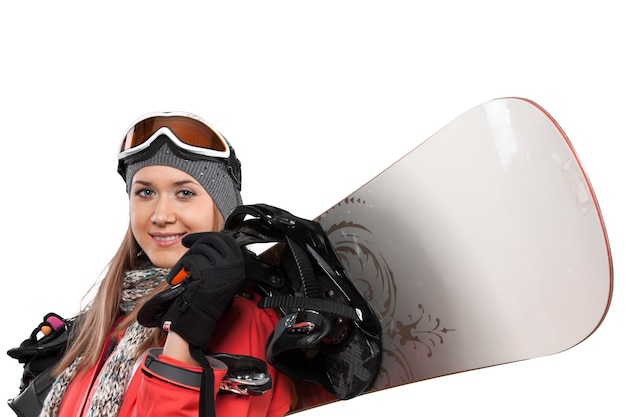 Donna che tiene tavola da snowboard isolata su bianco