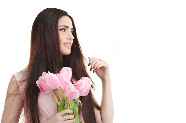 Donna con bouquet di tulipani