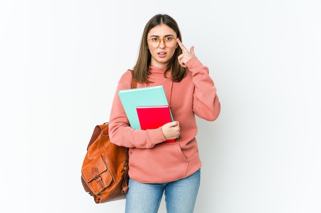 Donna giovane studente che mostra un gesto di delusione con l'indice