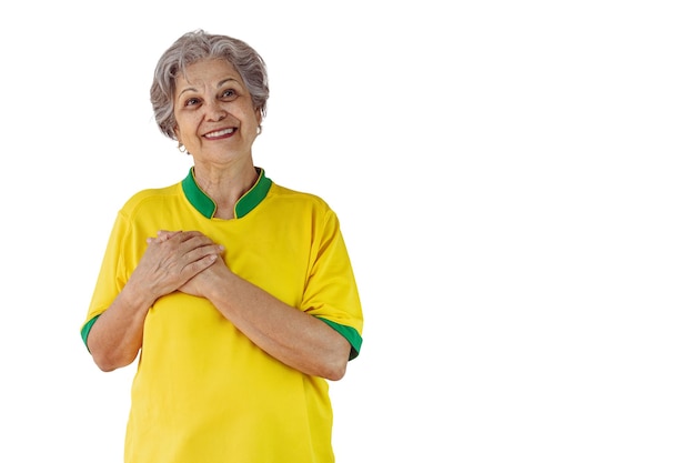 Donna matura con la maglia gialla della squadra di calcio isolata su bianco