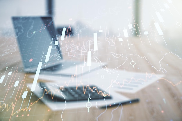 Doppia esposizione del diagramma finanziario creativo astratto e mappa del mondo sulla calcolatrice e sullo sfondo del pc concetto bancario e contabile