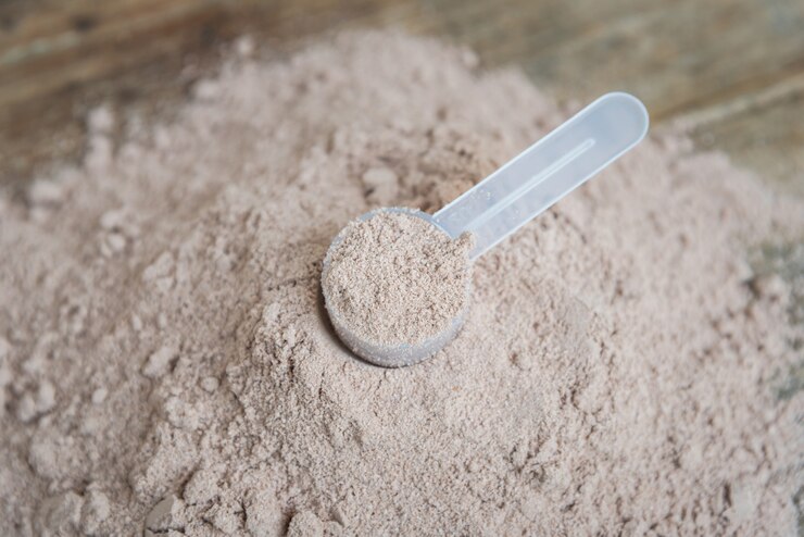 Doppio cioccolato cioccolata proteine polvere paletta nutrizione cibo sano bodybuilding.