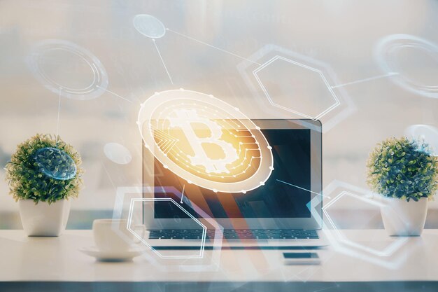 Double exposure of blockchain and crypto economy theme hologram and table with computer background Concept of bitcoin cryptocurrency