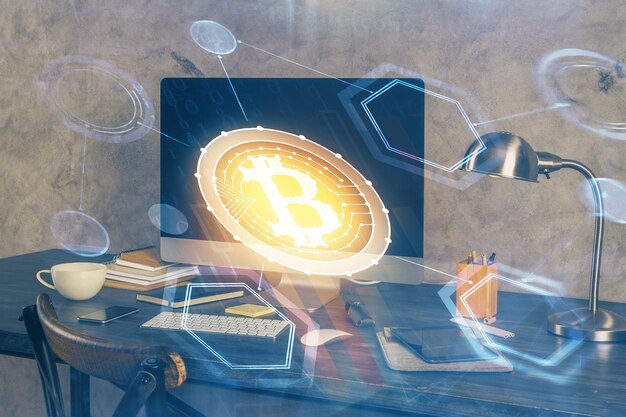 Double exposure of blockchain and crypto economy theme hologram and table with computer background Concept of bitcoin cryptocurrency