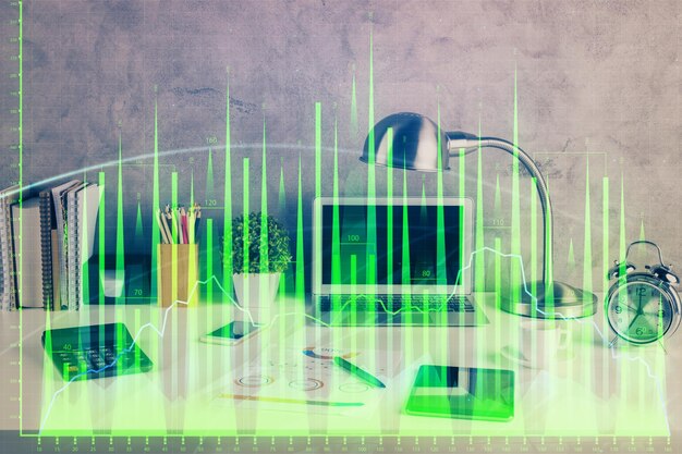 double exposure of forex graph and work space with computer concept of international online trading