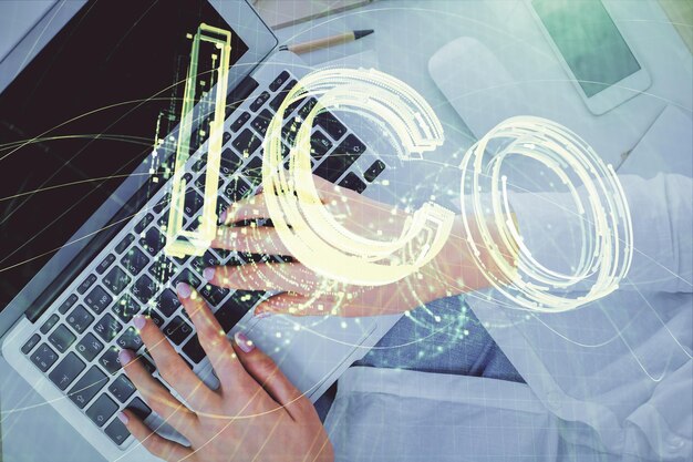 double exposure of woman hands working on computer and blockchain theme hologram drawing top view bitcoin cryptocurrency concept