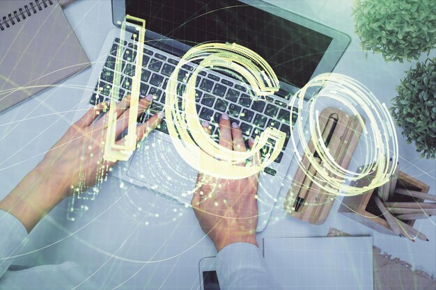 double exposure of woman hands working on computer and blockchain theme hologram drawing top view bitcoin cryptocurrency concept