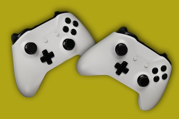 Due gamepad in volo su sfondo giallo