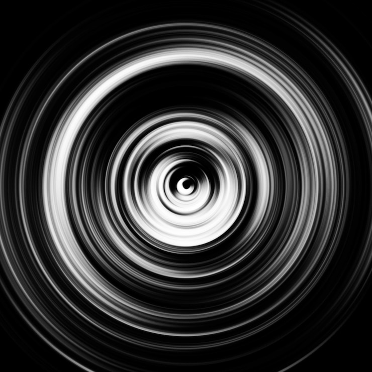 Foto effetto di movimento radiale in bianco e nero sfondio arrotondato astratto curve in scala di grigio e sfera