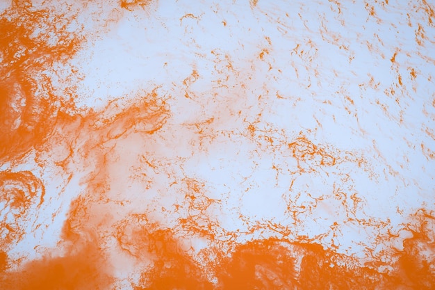 Effetto marmo di sfondo sfocato astratto arancione e bianco
