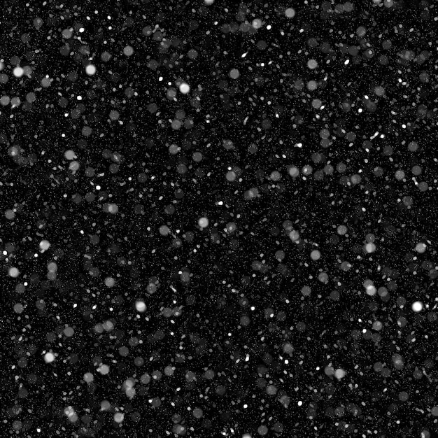 Effetto texture neve bianca naturale isolata su sfondo nero notte