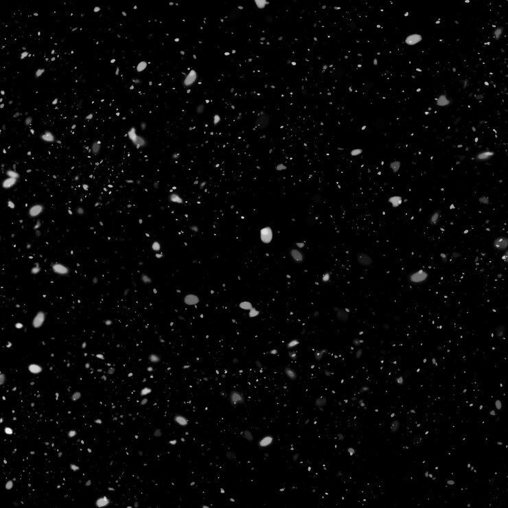Foto effetto texture neve bianca naturale isolata su sfondo nero notte
