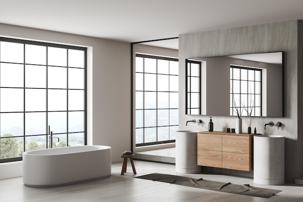 Elegante bagno interno con doppio lavabo e accessori vasca e finestra