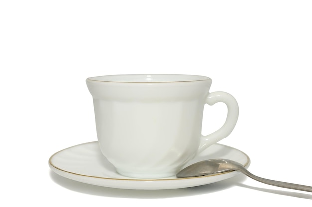 Elegante tazza da tè vintage con piattino e cucchiaio per caffè e tè