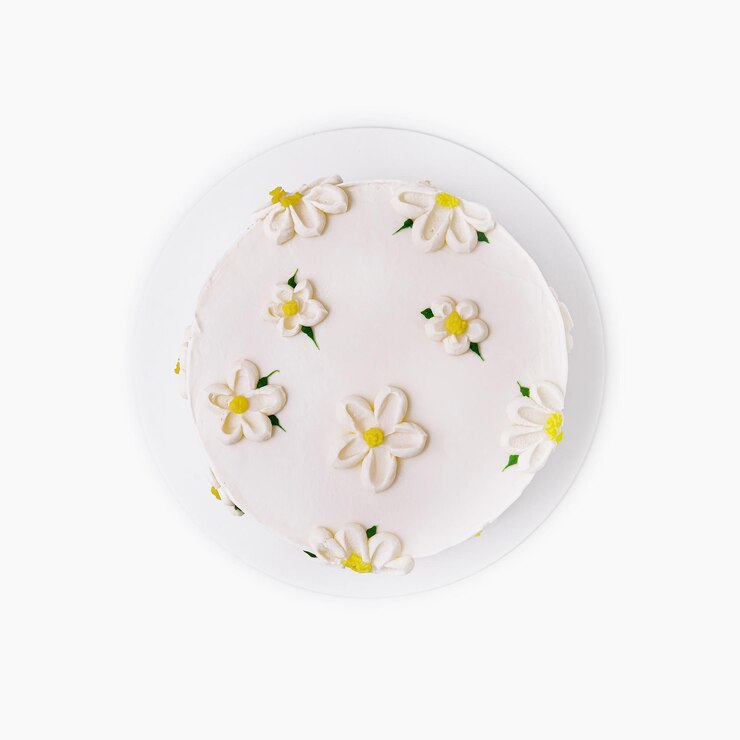 Foto elegante torta floreale bianca su sfondo bianco