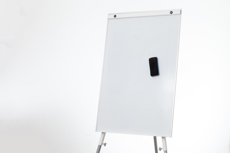 Empty white board with sponge on tripod isolated on white background