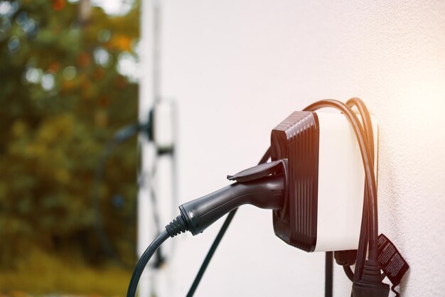 Energia sostenibile per il tuo veicolo elettrico Caricatore residenziale montato a parete per plug-in ibrido per veicoli elettrici