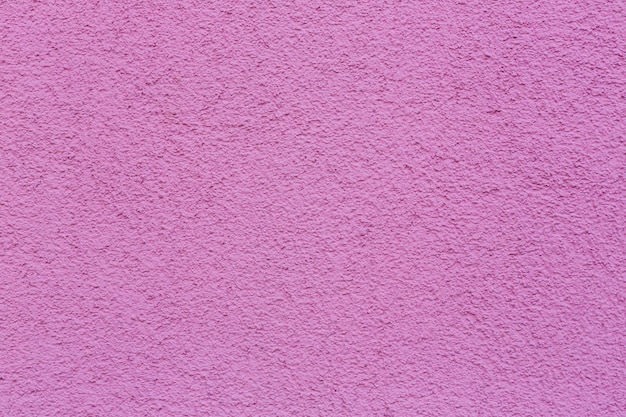 Esempio di struttura in gesso rosa La parete è rifinita con stucco decorativo in cemento Un esempio di parete decorativa con cemento rosa Struttura in cemento rosa delle pareti per lo sfondo e la carta da parati