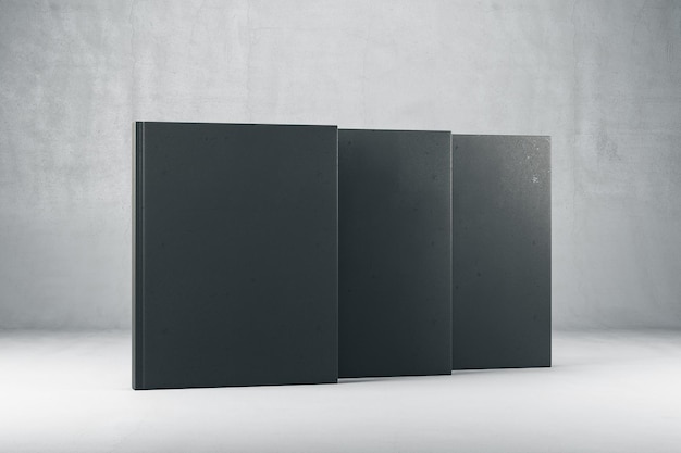 Estratto chiuso tre libri con copertina rigida nera