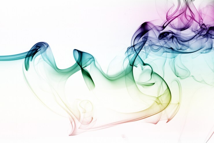 Estratto variopinto del fumo su fondo bianco. movimento dell'acqua dell'inchiostro