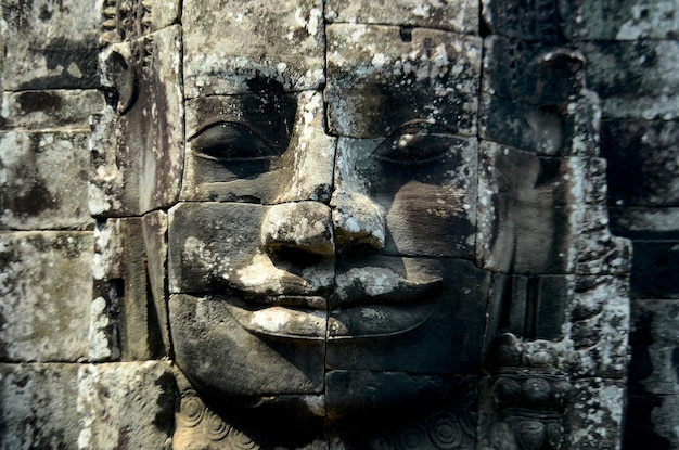 Faccia di pietra di Buddha Sorriso Buddha faccia Tempio complesso Angkor Wat Bayon tempio Angkor Thom Cambogia