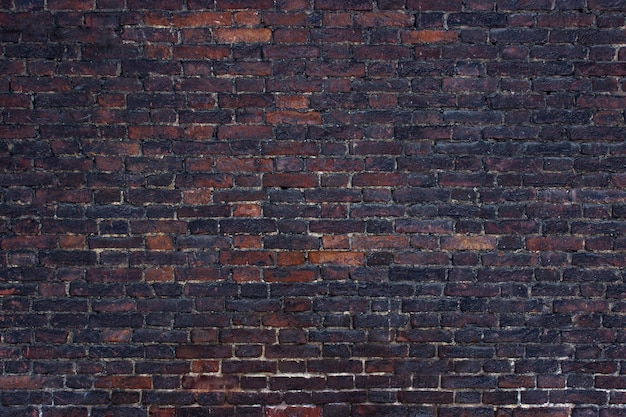 Facciata antica della pietra di struttura del muro di mattoni dell'edificio