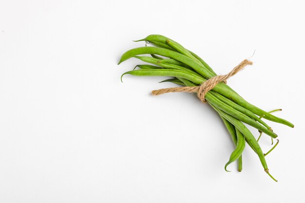 Fagioli comuni o baccelli di fagioli dolici, concetto di fattoria fresca