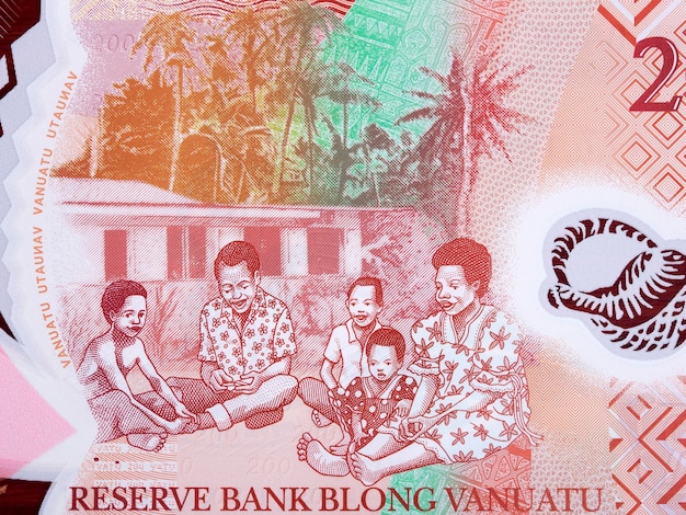 Famiglia di cinque persone sedute fuori casa dai soldi di Vanuatu