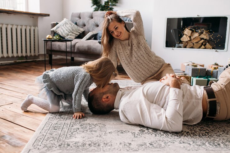 Famiglia divertendosi insieme a casa