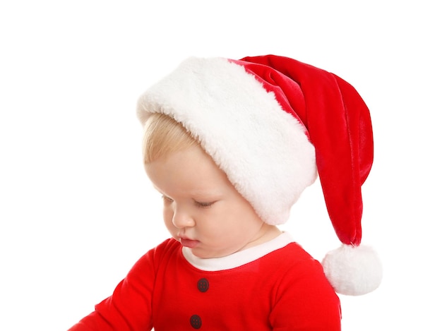 Felice piccolo bambino con cappello da Babbo Natale, isolato su bianco